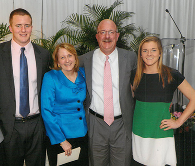 Dr. Janet Scheel with husband Dr. Paul Scheel and their children