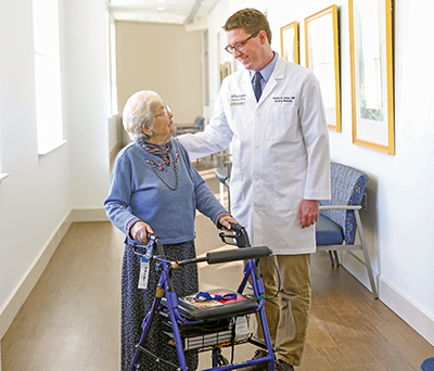 Dr. Timothy Holden and patient 