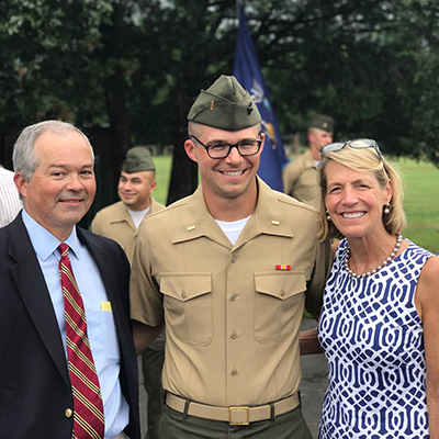 Dr. Chapman and his wife with their son at Officer Candidate School graduation