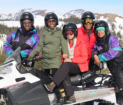 Dr. Oladapo (far left) snowmobiling in Lake Tahoe, California with friends