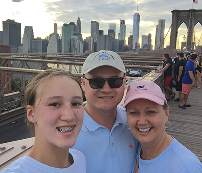 Dr. John Cole and his family on vacation in New York City